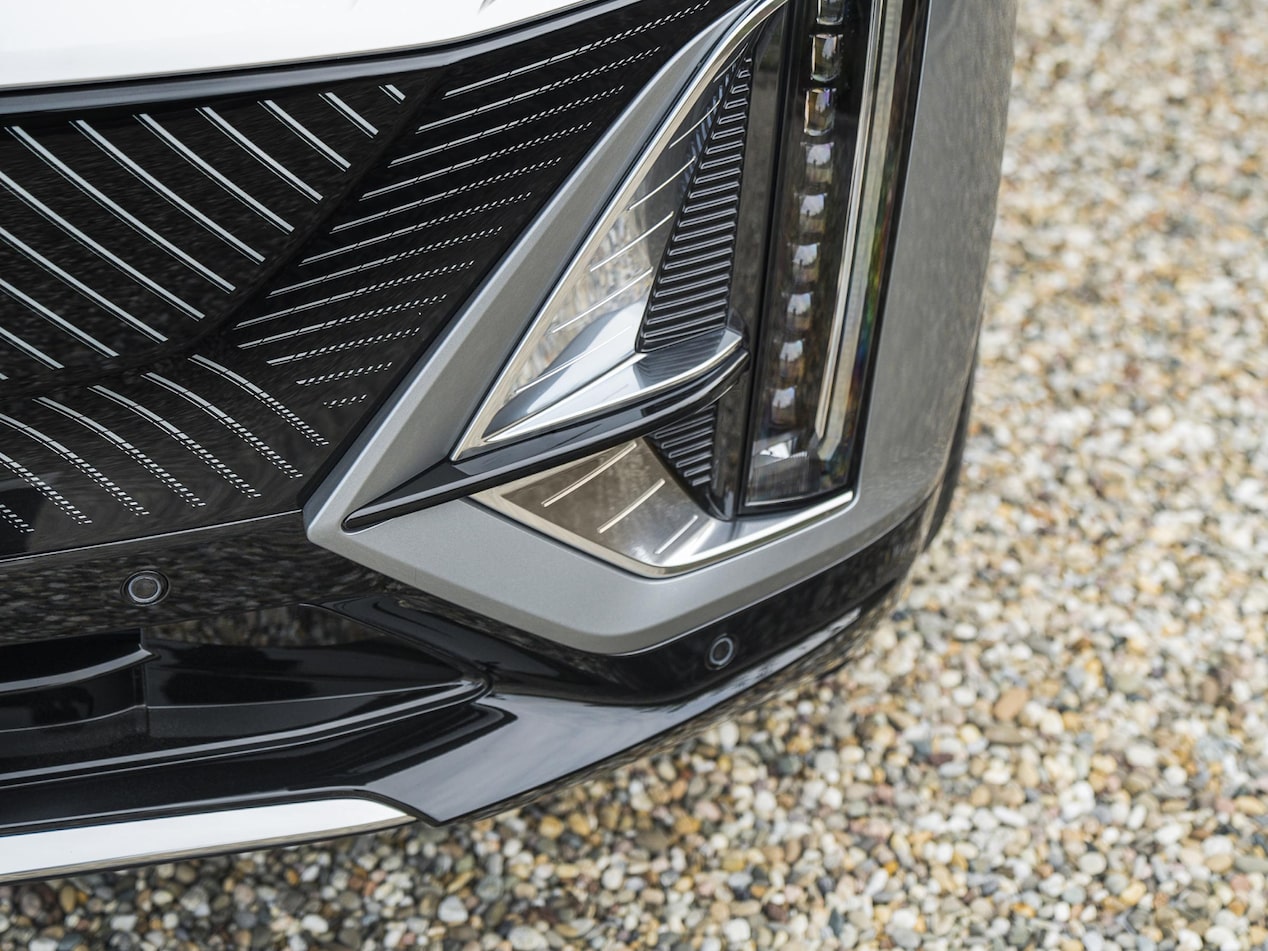 Sensors and cameras discreetly integrated into the vehicle's front end.